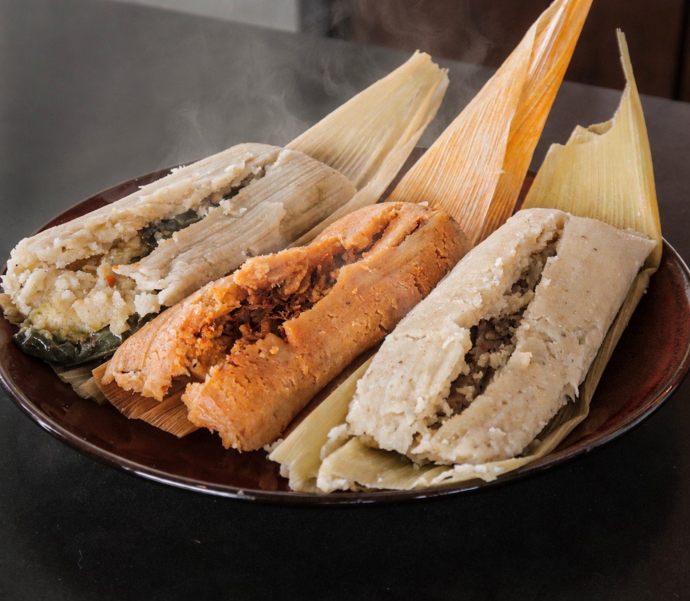 Steaming handmade tamales — chicken, pork, and cheese & jalapeño